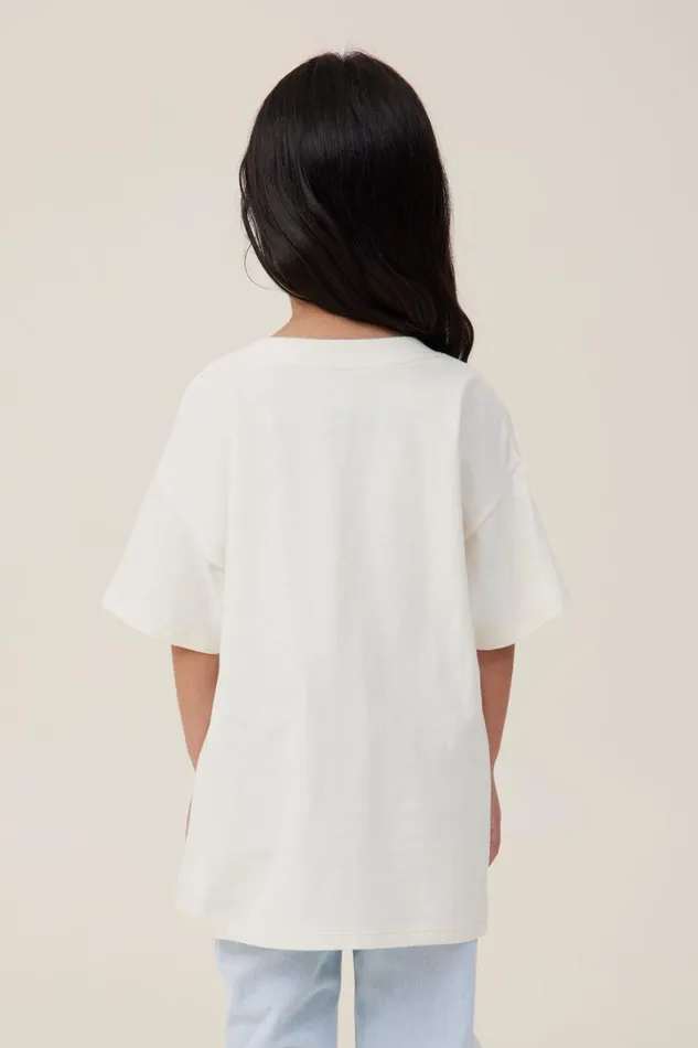 Girls 214 Tops and TShirts Cotton On License Drop Shoulder Short Sleeve Tee Lcn Bra Willie Nelsondark Vanilla
