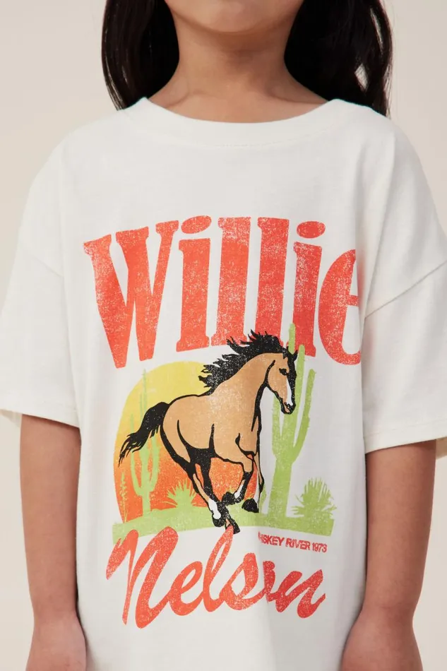 Girls 214 Tops and TShirts Cotton On License Drop Shoulder Short Sleeve Tee Lcn Bra Willie Nelsondark Vanilla