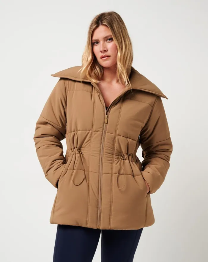 Women Jackets TravisMathew MONT BLANC LONG PUFFER Tigers Eye Women Jackets TravisMathew MONT BLANC LONG PUFFER Tigers Eye