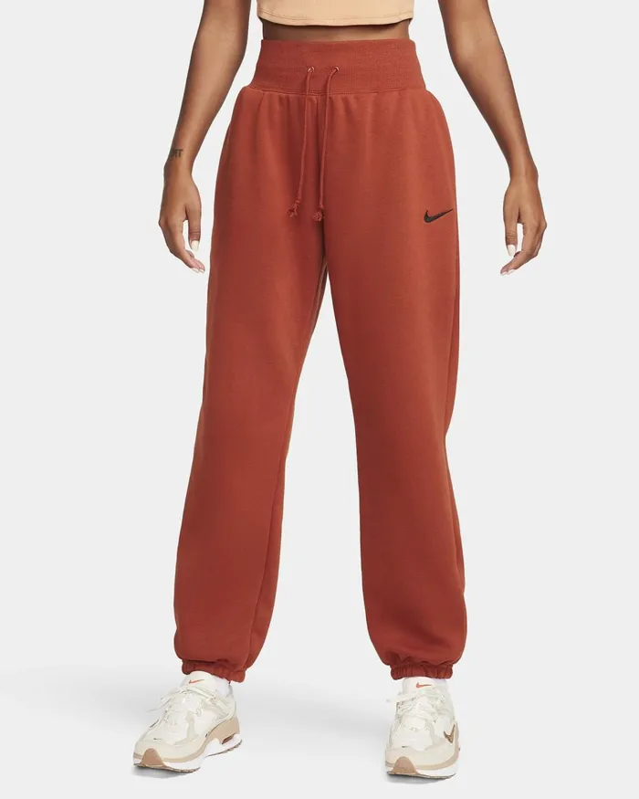 Women Nike Trousers Sportswear Phoenix Fleece Rugged Orangeblack